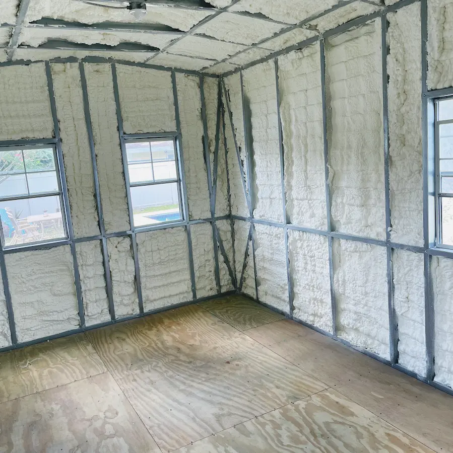 Closed-cell spray foam insulation applied to wall cavities in a residential project in Chester