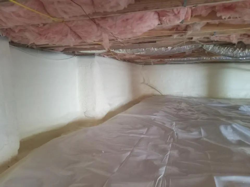 Crawl space encapsulation with closed-cell spray foam for Commercial Roof Restoration in Chester